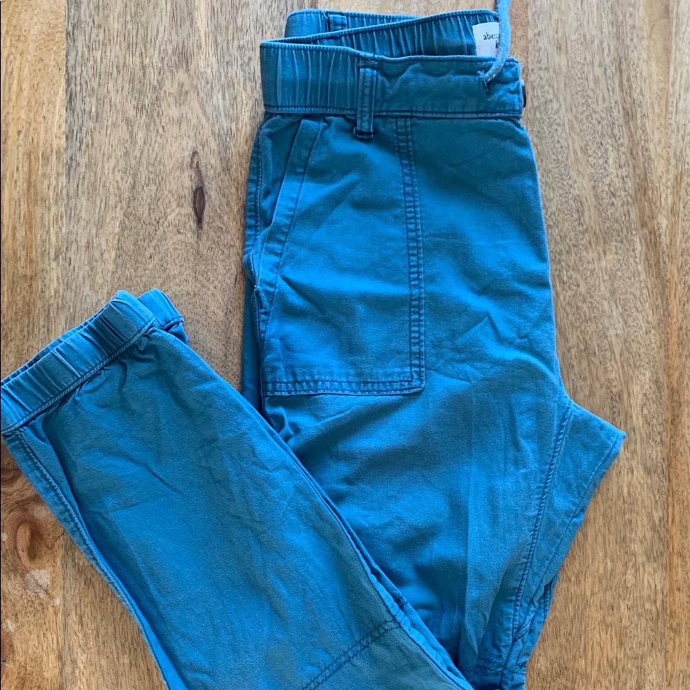 Teal blue flowy pants with tie at waist